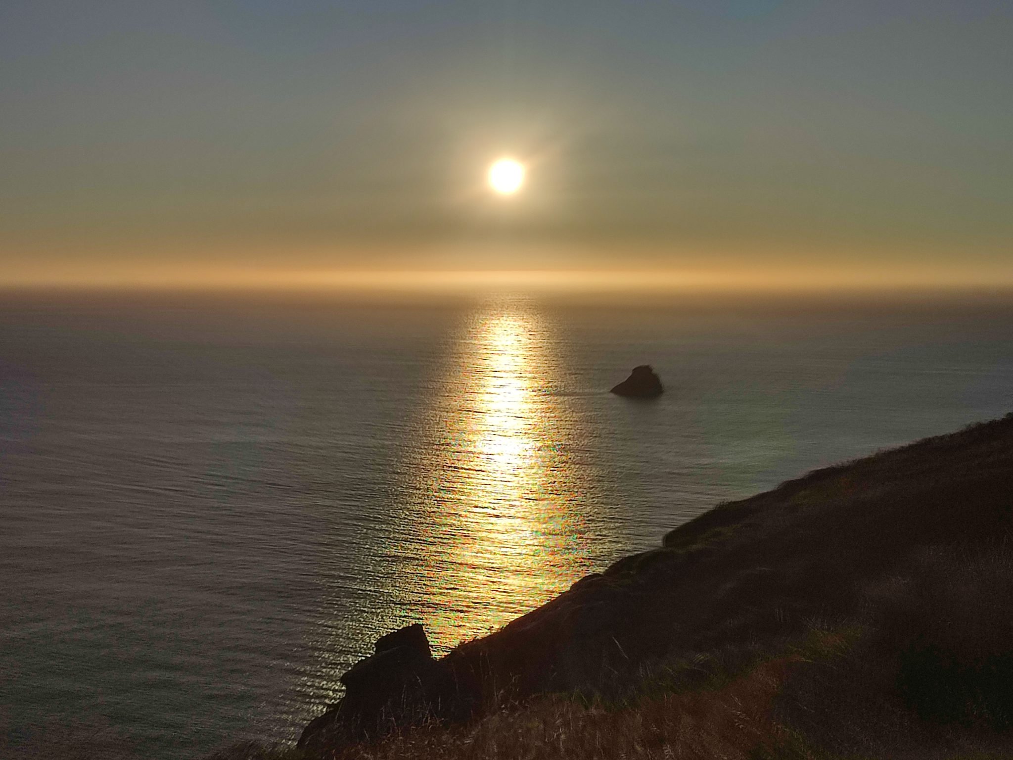 Puesta de sol en el Faro Fisterra